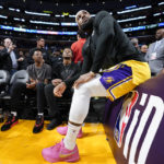 LeBron James chases NBA history on a star-filled night in LA