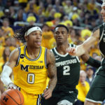 Spartans lose to Michigan in their first game since shooting