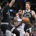 Sabonis' double-double helps Kings power past Spurs 119-109