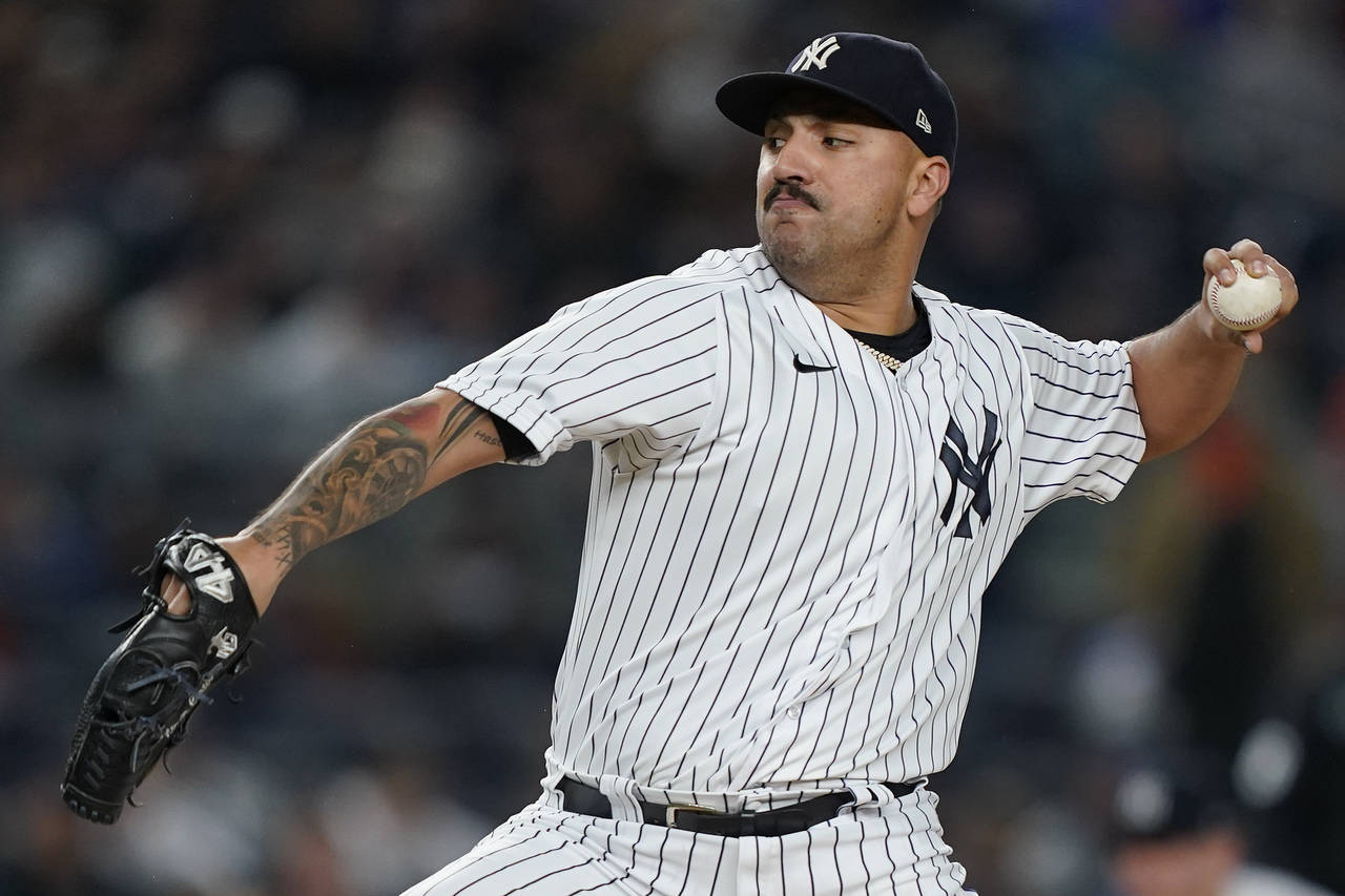 FILE - New York Yankees starting pitcher Nestor Cortes delivers against the Houston Astros during t...