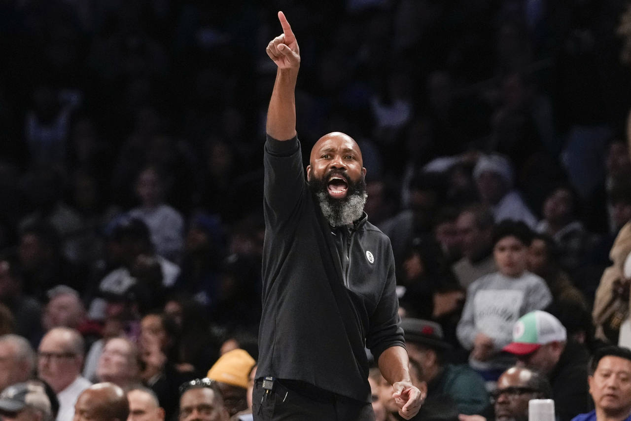 Brooklyn Nets head coach Jacque Vaughn reacts during the second half of an NBA basketball game agai...