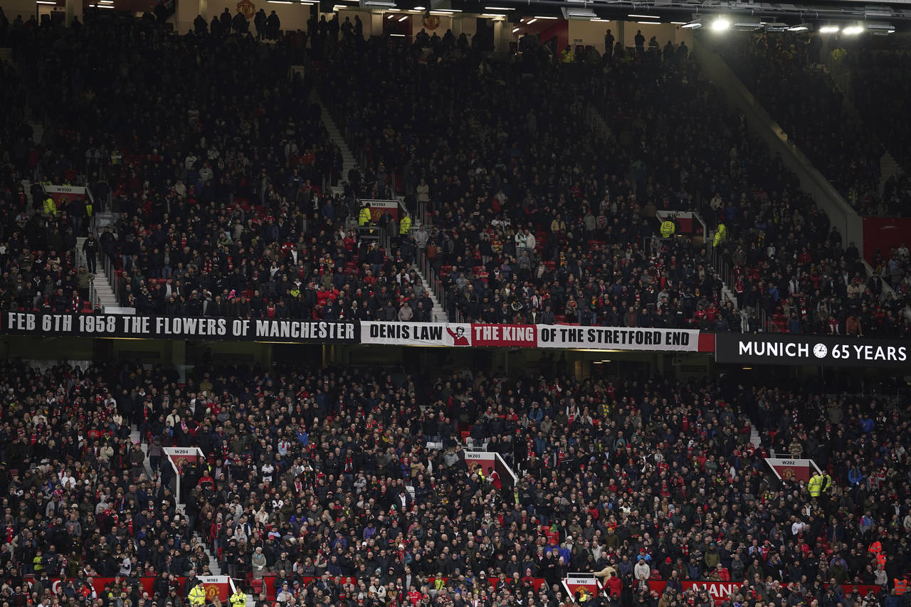 A tribute to Manchester United team - nicknamed the "Busby Babes" is displayed on screen in memory ...