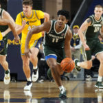 Spartans lose to Michigan in their first game since shooting