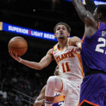 Young scores 36 as Hawks beat short-handed Suns 116-107