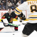 Bruins goaltender Linus Ullmark scores into empty net