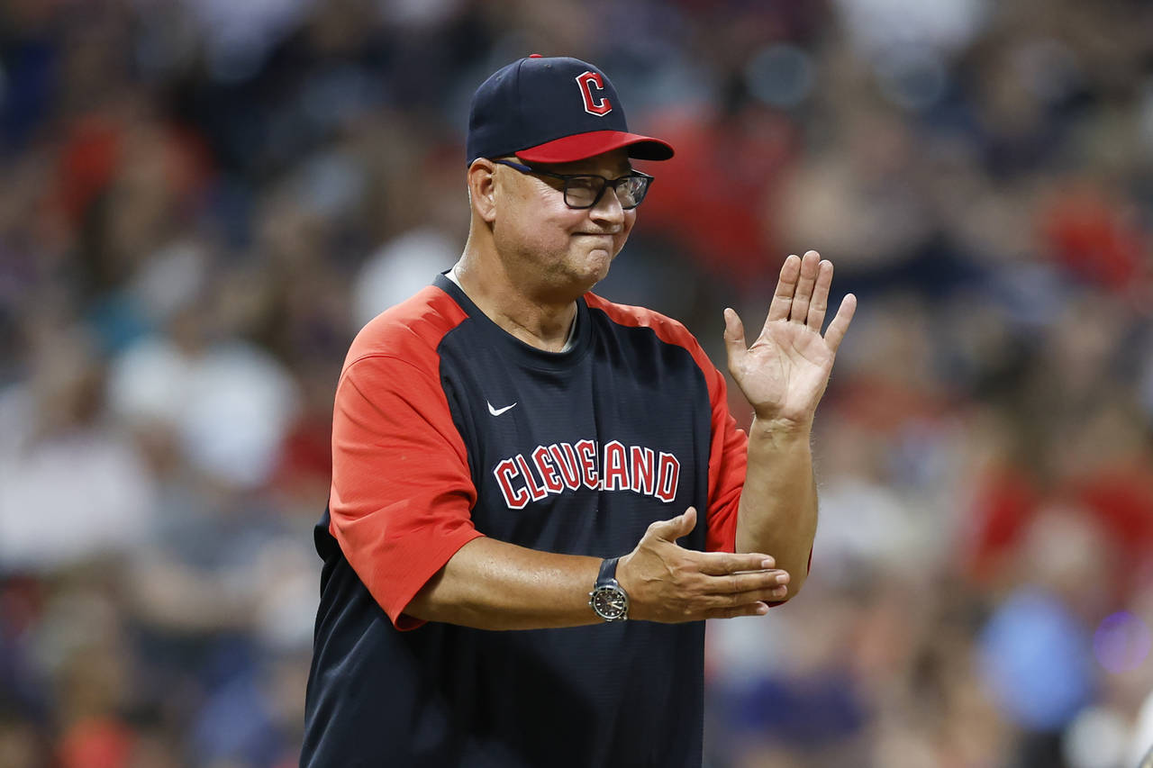 FILE - Cleveland Guardians manager Terry Francona makes a pitching change during the team's basebal...