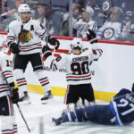 Wheeler scores 2 to lead Jets in 4-1 win over Blackhawks