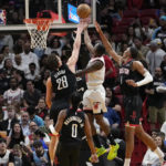 Butler's dunk at end gives Heat 97-95 win over Rockets
