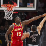 Young, Hunter pace Hawks past reeling Spurs 125-106