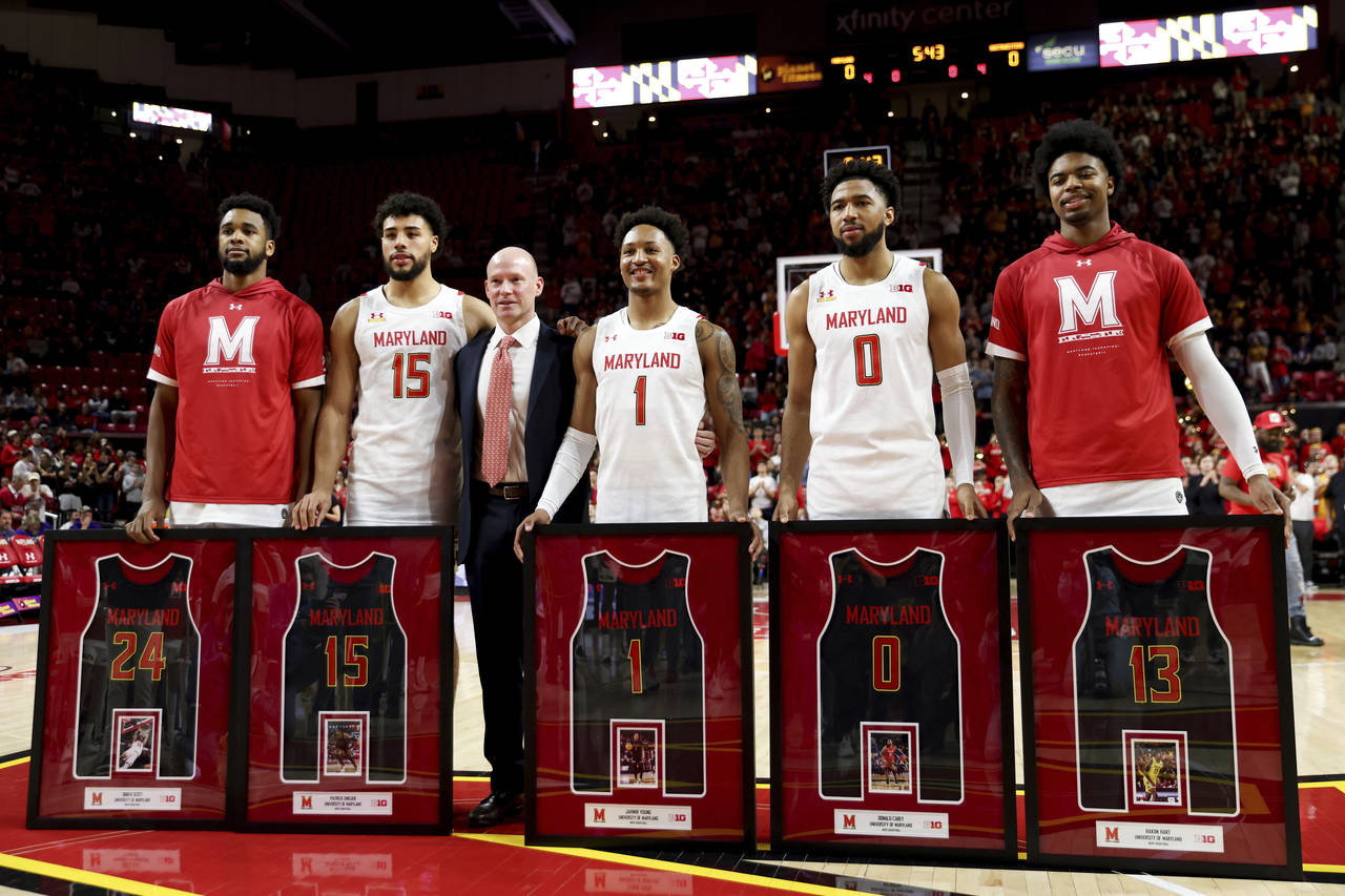 Maryland forward Donta Scott, forward Patrick Emilien, head coach Kevin Willard, guard Jahmir Young...