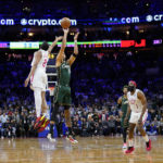 Tatum's late 3 lifts Celtics past Embiid, 76ers 110-107