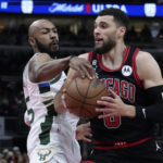 Giannis sets assists mark, hurts wrist; Bucks beat Bulls