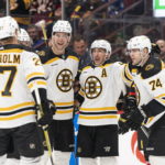 Bruins goaltender Linus Ullmark scores into empty net