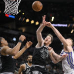 Sabonis' double-double helps Kings power past Spurs 119-109