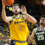 Spartans lose to Michigan in their first game since shooting