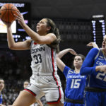 Behind Ducharme, No. 6 UConn rallies past Creighton 62-60