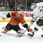 Kings overcome goalie's match penalty, beat rival Ducks 6-3