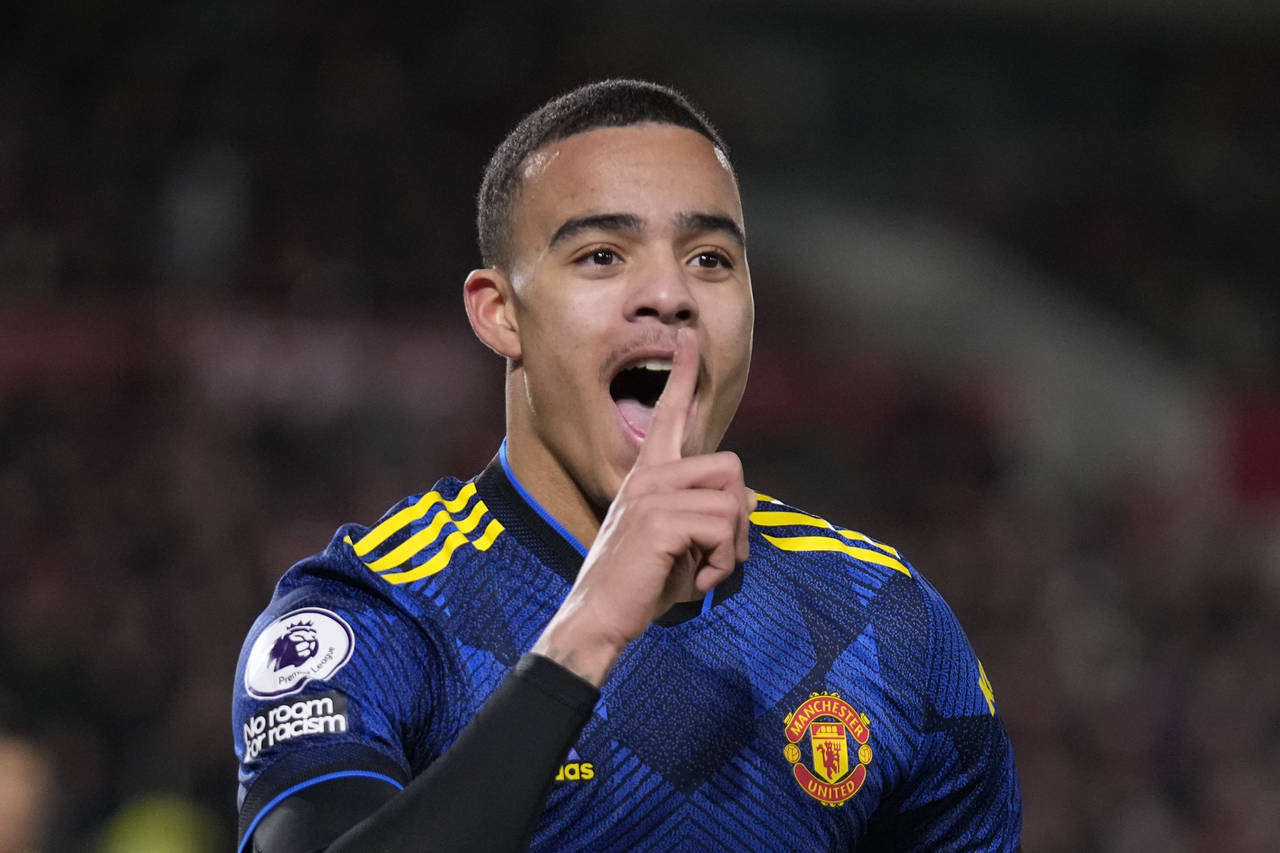 FILE - Manchester United's Mason Greenwood celebrates after scoring his side's second goal during a...