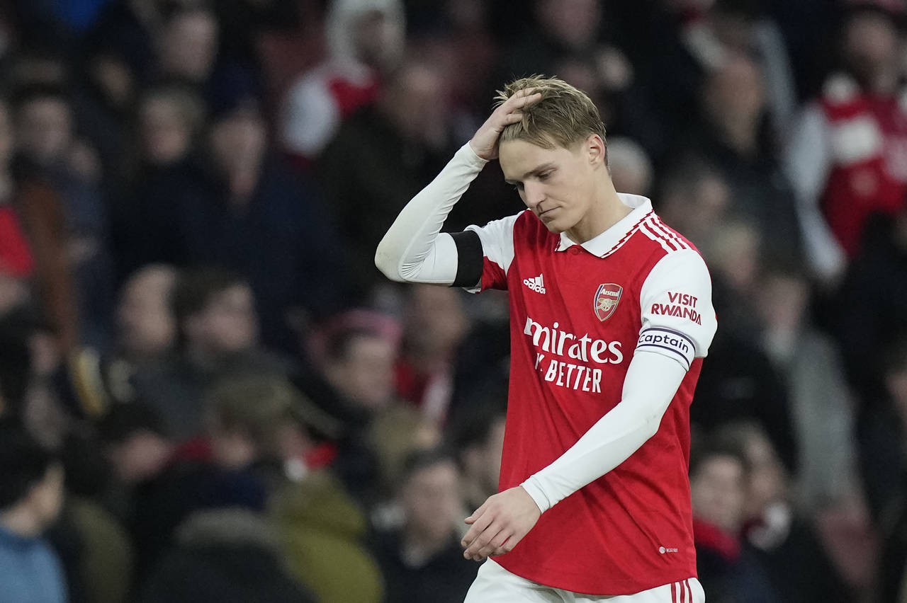 Arsenal's Martin Odegaard reacts after the English Premier League soccer match between Arsenal and ...