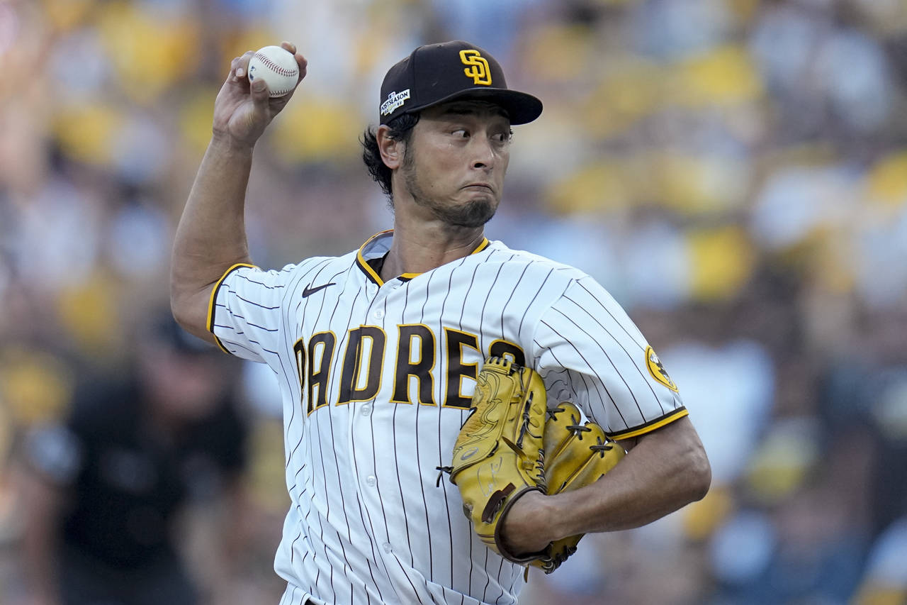 FILE - San Diego Padres starting pitcher Yu Darvish throws against the Philadelphia Phillies during...