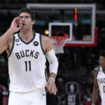 Giannis sets assists mark, hurts wrist; Bucks beat Bulls