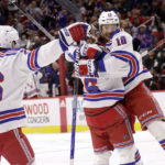 Panarin's 4-goal night helps Rangers stop Hurricanes' streak