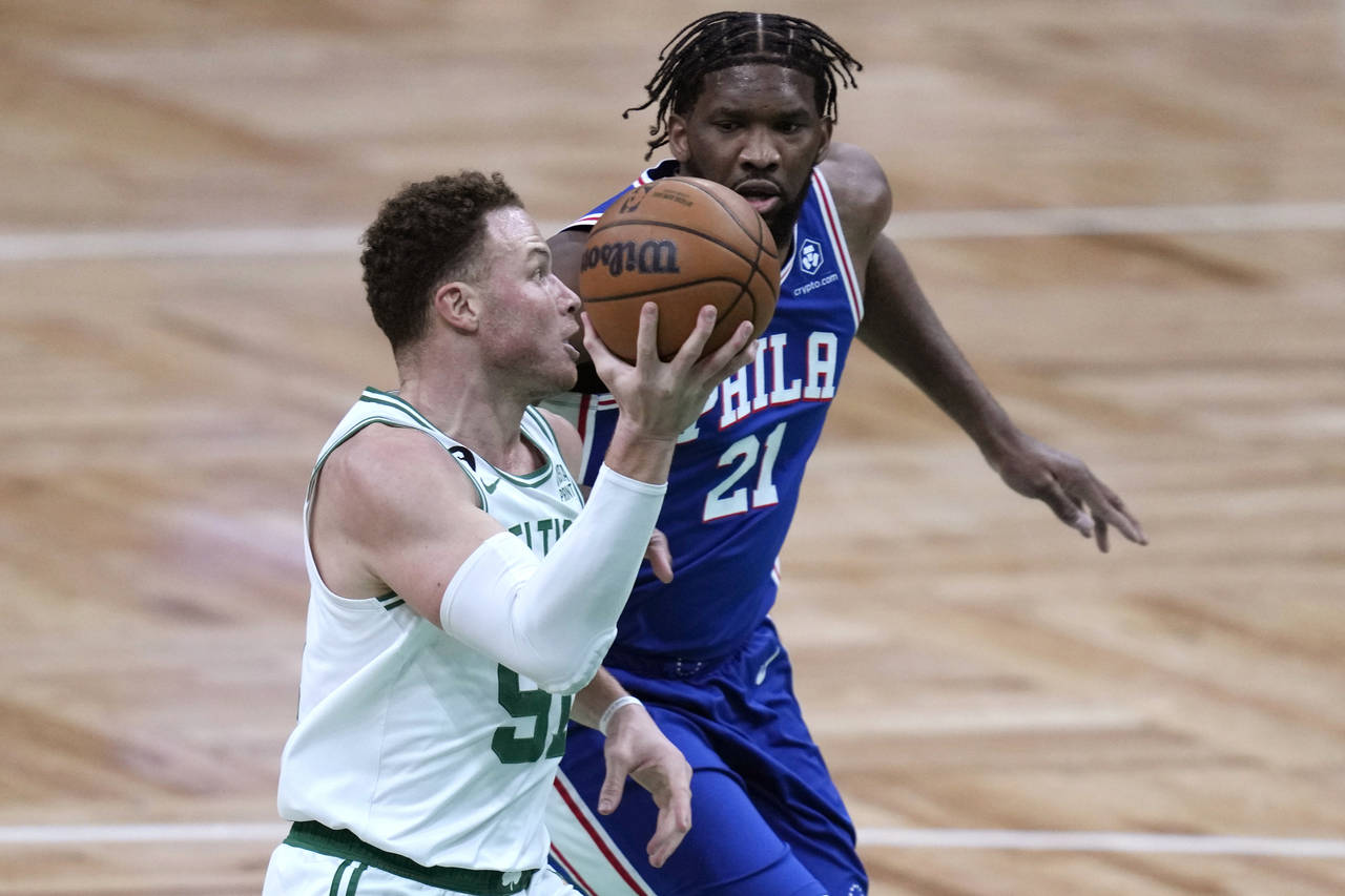 Boston Celtics forward Blake Griffin (91) drives to the basket against Philadelphia 76ers center Jo...