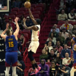 Nikola Jokic scores 27, Nuggets hold off Heat 112-108