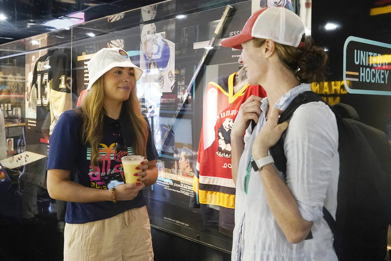Sarah Nurse, left, a Canadian hockey player and two-time Olympic gold medalist, and A.J. Mleczko, r...