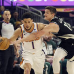 Bucks outlast Suns 104-101 for 14th consecutive victory