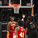 Young's buzzer-beating jumper lifts Hawks past Nets 129-127
