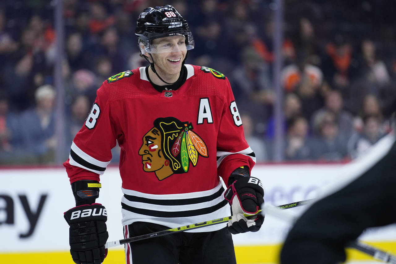 FILE - Chicago Blackhawks' Patrick Kane smiles during an NHL hockey game Jan. 19, 2023, in Philadel...