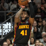 Hawks pull away in 1st half, rout Cavaliers 136-119