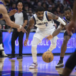 Fox scores 36 points, Kings beat Mavericks 133-128 in OT