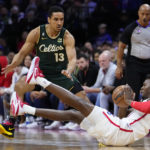 Tatum's late 3 lifts Celtics past Embiid, 76ers 110-107