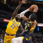 James closes in on scoring record, Lakers rally past Pacers