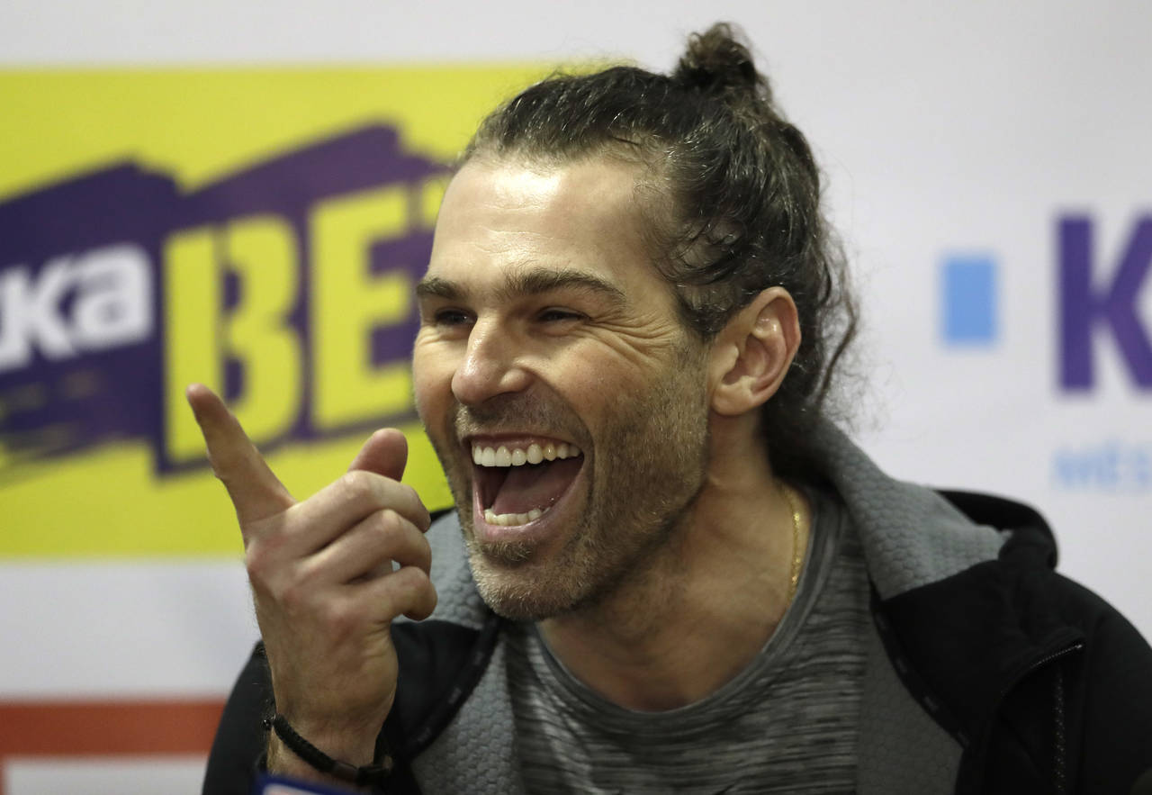 FILE - Jaromir Jagr smiles during a press conference at the Kladno Knights hockey club in Kladno, C...