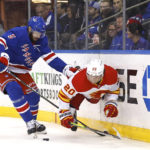 Lafreniere scores in OT to lift Rangers over Flames 5-4