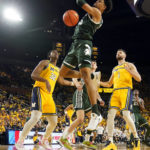 Spartans lose to Michigan in their first game since shooting