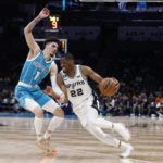 Ball has triple-double, Hornets hand Spurs 14th loss in row