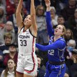 Behind Ducharme, No. 6 UConn rallies past Creighton 62-60