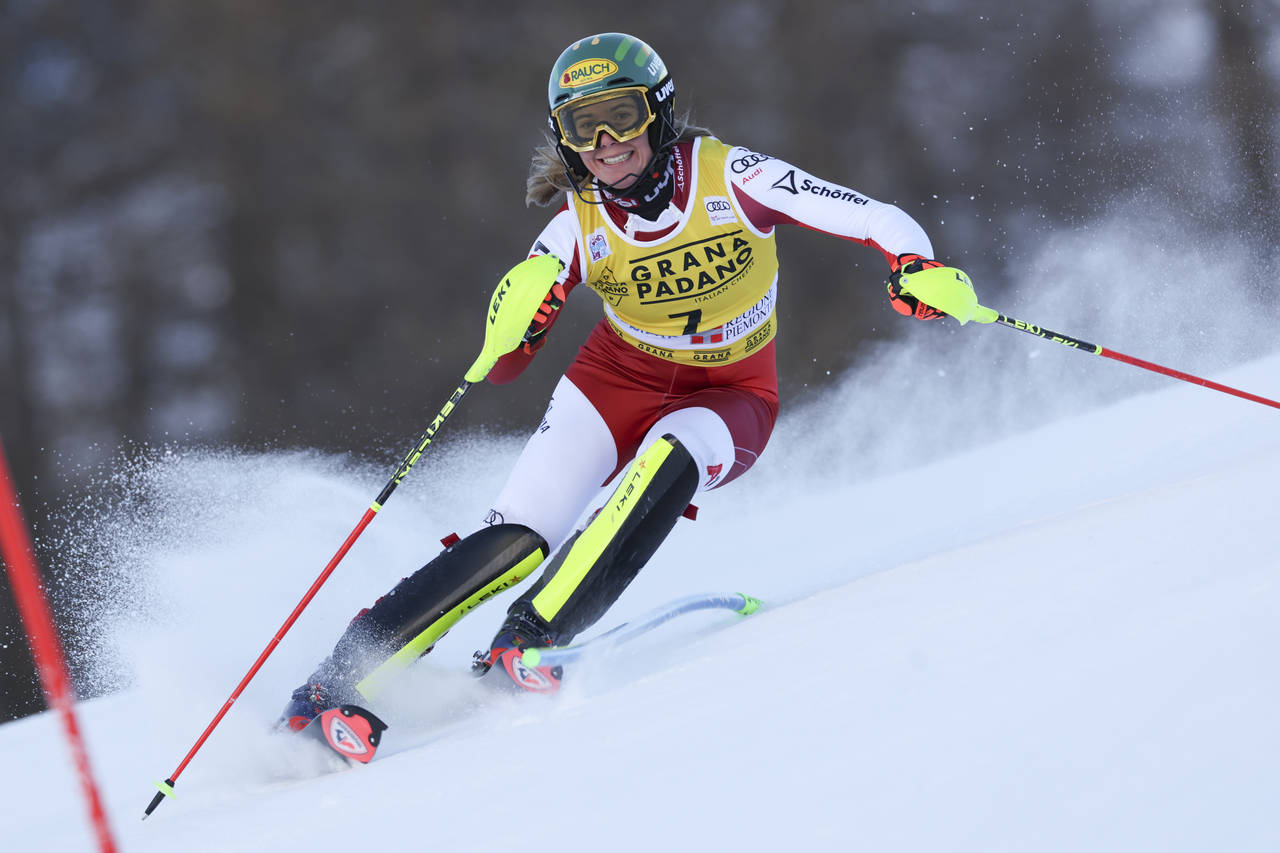 FILE - Austria's Katharina Liensberger speeds down the course during the first run of an alpine ski...