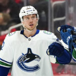 Larkin, Berggren score 2 goals apiece, Wings down Canucks