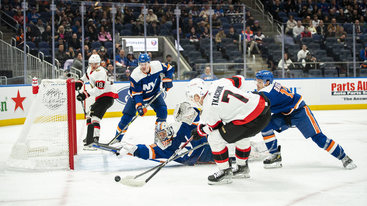 New York Islanders goaltender Ilya Sorokin (30) deflects a shot by Ottawa Senators left wing Brady ...