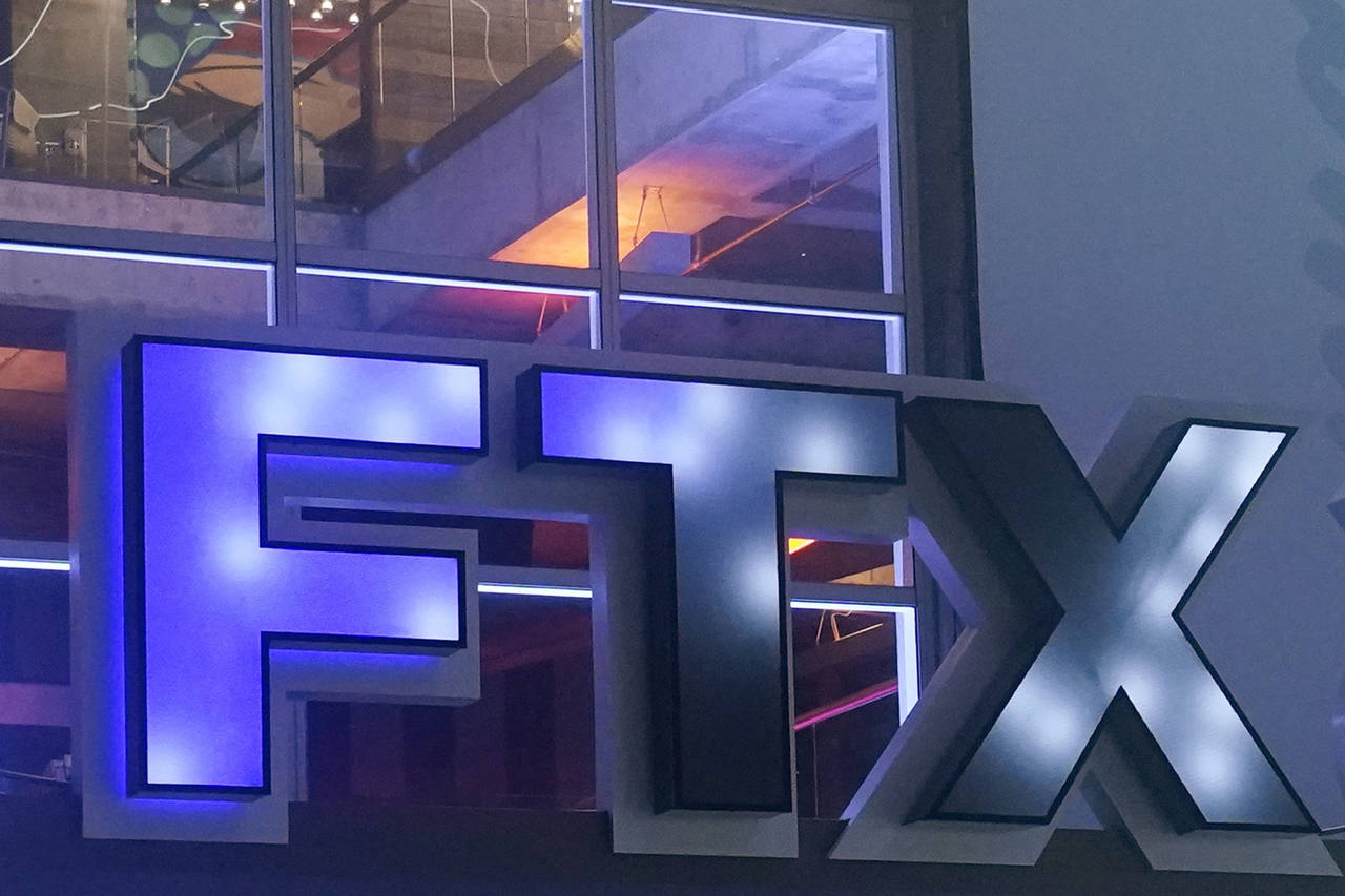 FILE - The logo for cryptocurrency company FTX is displayed on the arena once known as FTX Arena, a...