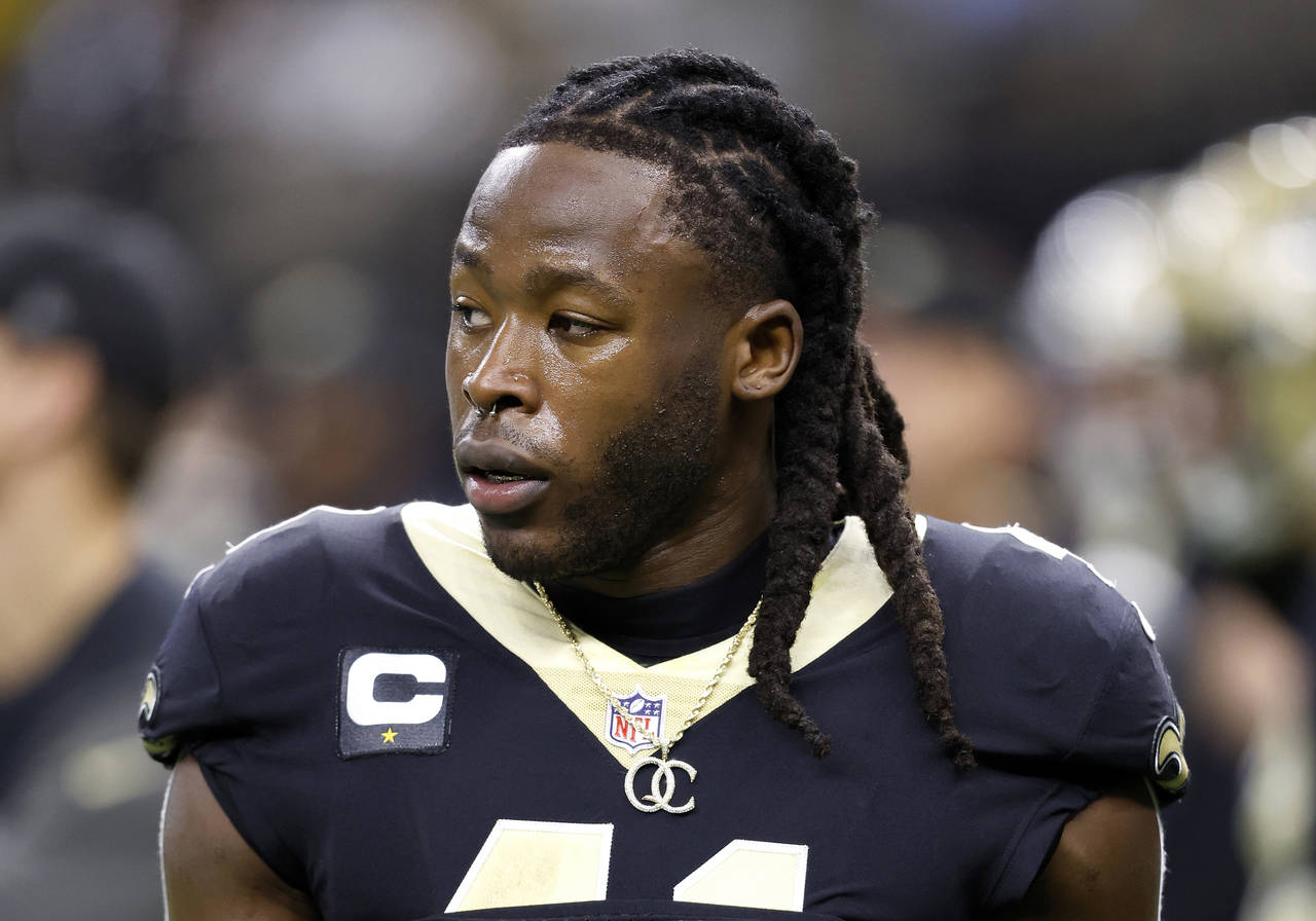 FILE - New Orleans Saints running back Alvin Kamara warms up for the team's NFL football game again...