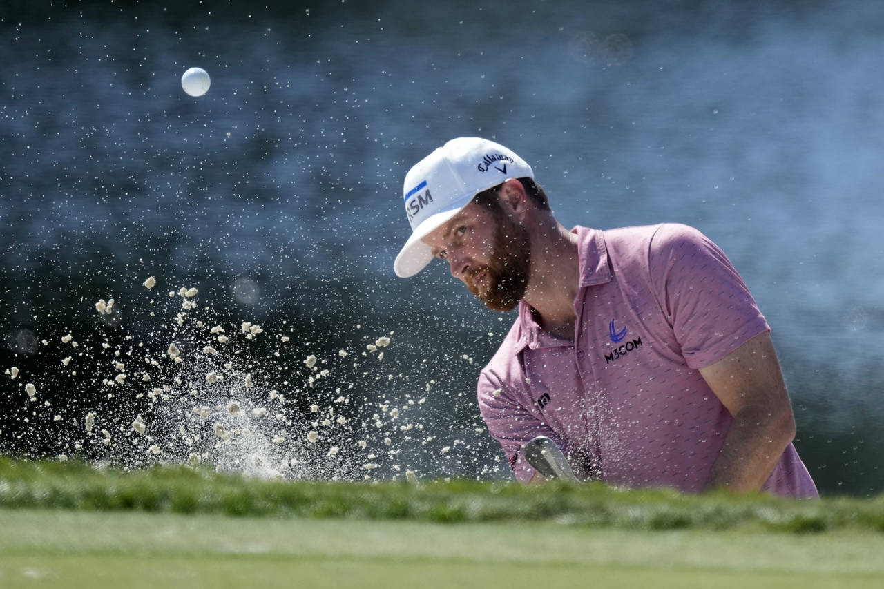 Charles Kirk hits from a bunker onto the sixth green during the third round of the Honda Classic go...