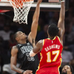 Young's buzzer-beating jumper lifts Hawks past Nets 129-127