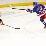 Lafreniere scores in OT to lift Rangers over Flames 5-4