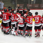Stauber remains perfect as Blackhawks beat Coyotes 4-3 in OT